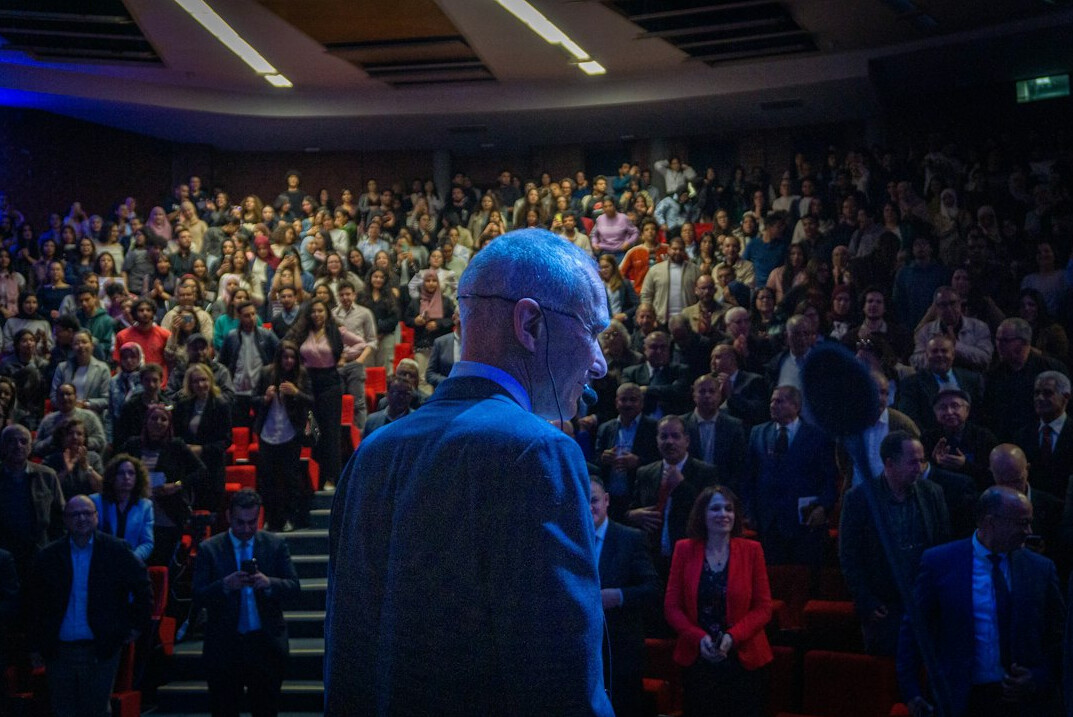 crowd in heated debate