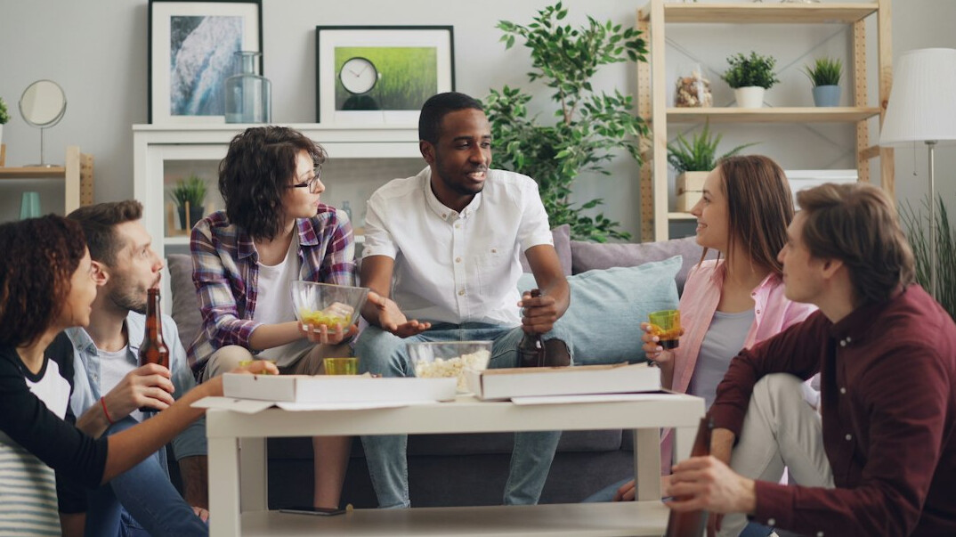 diverse people discussing in circle